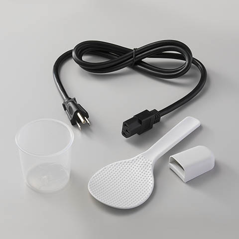 Accessories include rice measuring cup, spatula and spatula holder